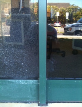 before and after results showing hard water stain removal on window at Mid Pacific Institute