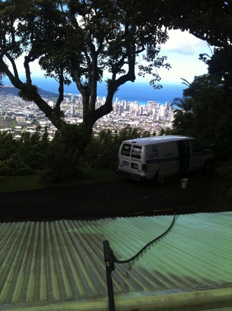 roof of honolulu home showing before and after pressure washing service to remove mold and dirt